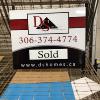 Aluminum composite sign face with removable SOLD plaque.